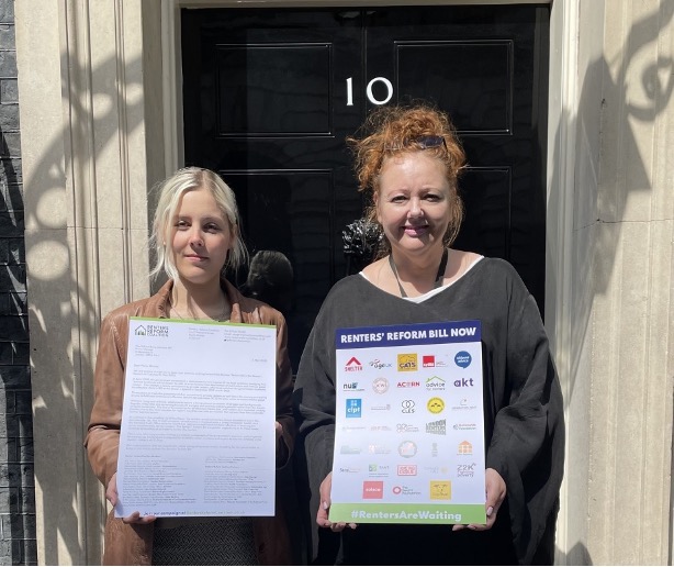 RRC team handing letter into no.10 Downing Street